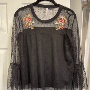 Long sleeved, lightweight sheer blouse